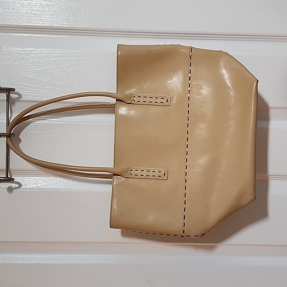 Capaccioli cream colored leather purse. *P-41.2